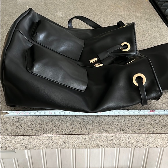 ASOS DESIGN slouchy backpack with oversized pocket - Picture 6 of 8